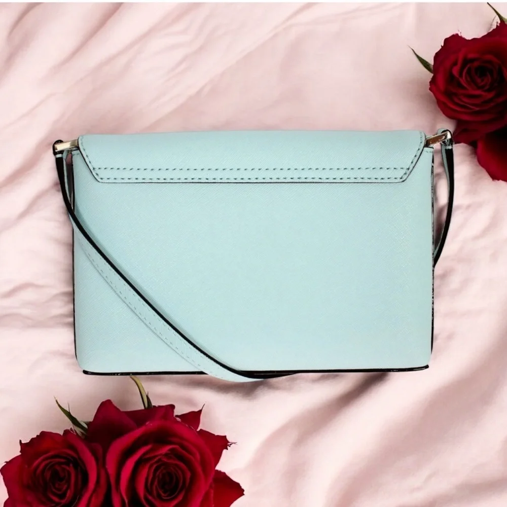 Kate Spade Light Blue Crossbody Bag with Gold Accents